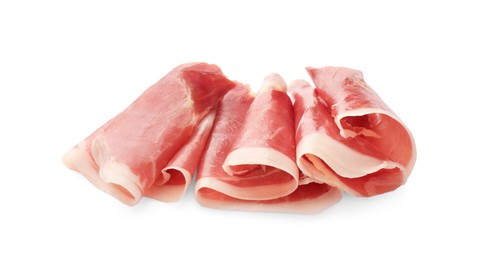 Slices of delicious jamon on white background