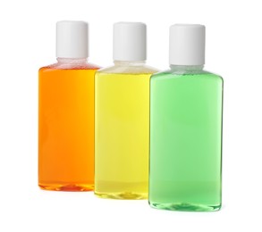 Three bottles of mouthwash isolated on white
