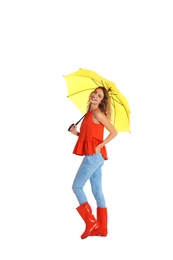 Woman with yellow umbrella on white background