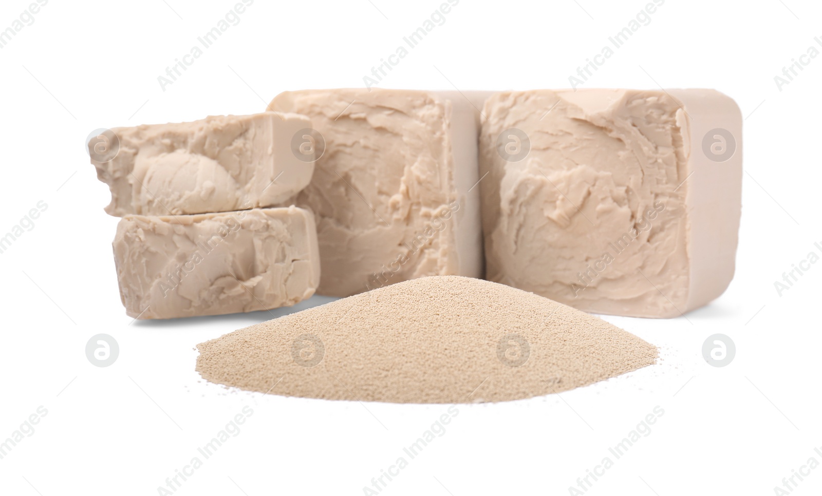Photo of Compressed and granulated yeast isolated on white