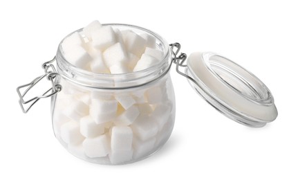 Photo of Glass jar of refined sugar cubes isolated on white