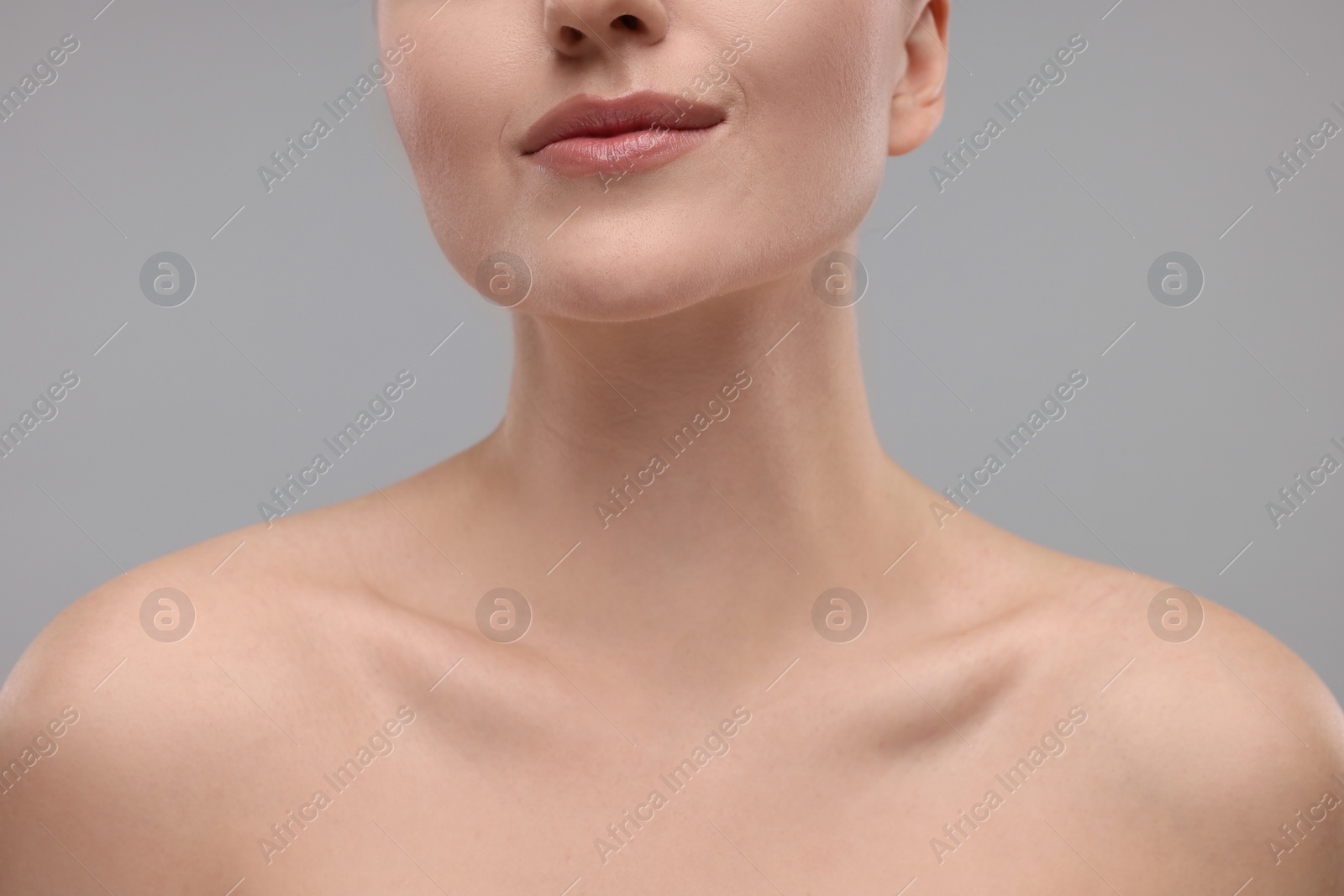 Photo of Beauty concept. Woman on grey background, closeup