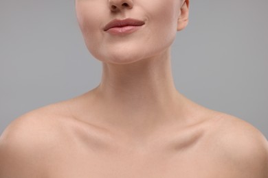 Beauty concept. Woman on grey background, closeup