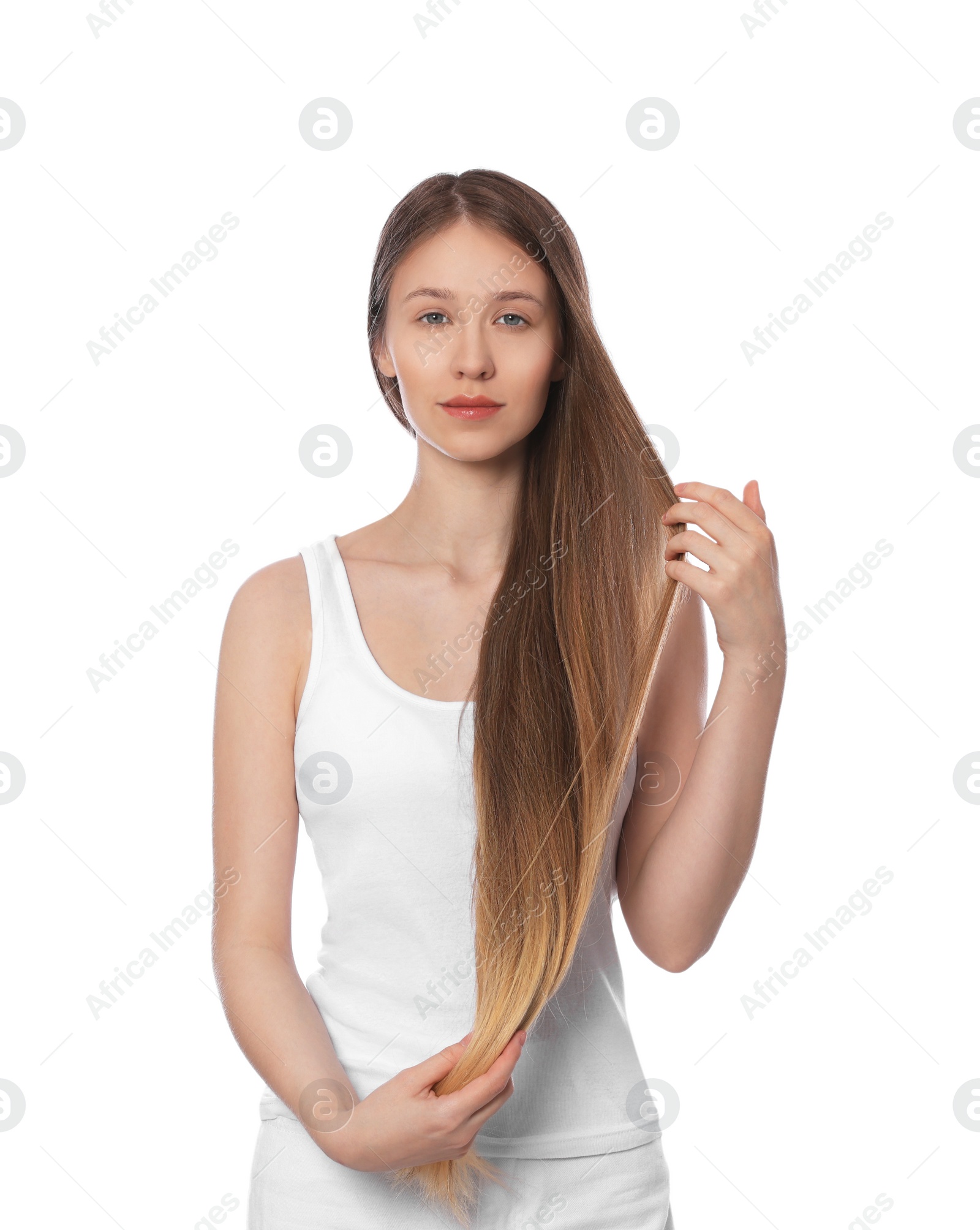 Photo of Teenage girl with strong healthy hair on white background