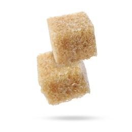 Image of Flying cubes of brown sugar on white background