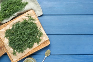 Photo of Flat lay composition with fresh dill preparing for drying on wooden table. Space for text