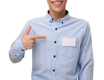 Photo of Man pointing at blank badge on white background, closeup