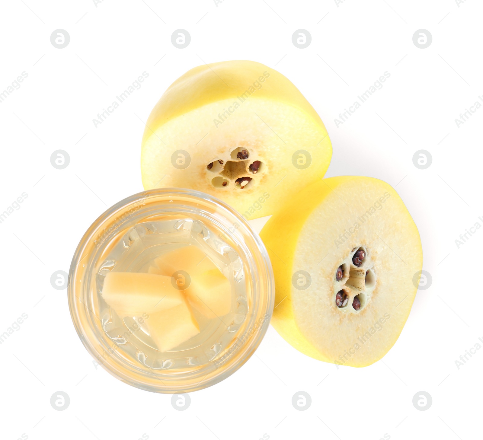 Photo of Delicious quince drink in glass and fresh fruit isolated on white, top view