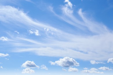 Photo of Picturesque blue sky with white clouds on sunny day