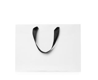 Photo of Paper shopping bag isolated on white. Mock up for design