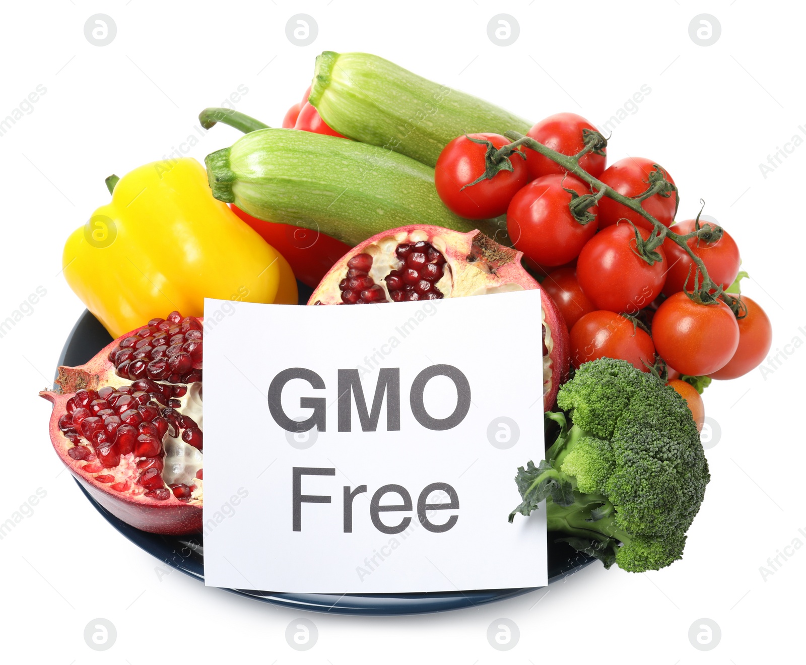 Photo of Tasty fresh GMO free products and paper card on white background