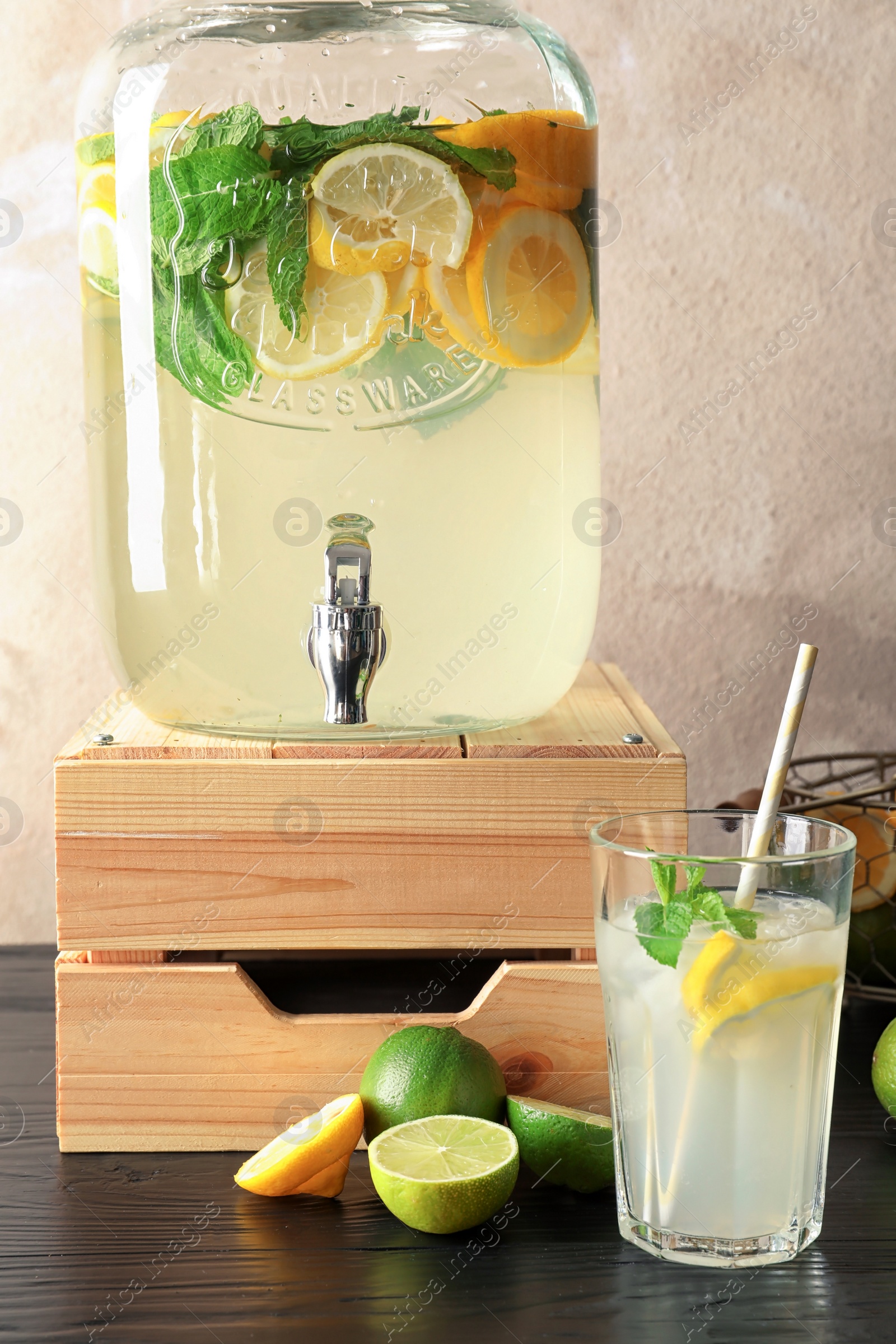 Photo of Glassware with natural lemonade on table