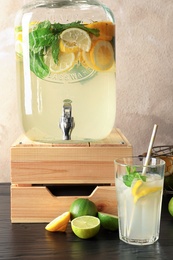 Glassware with natural lemonade on table