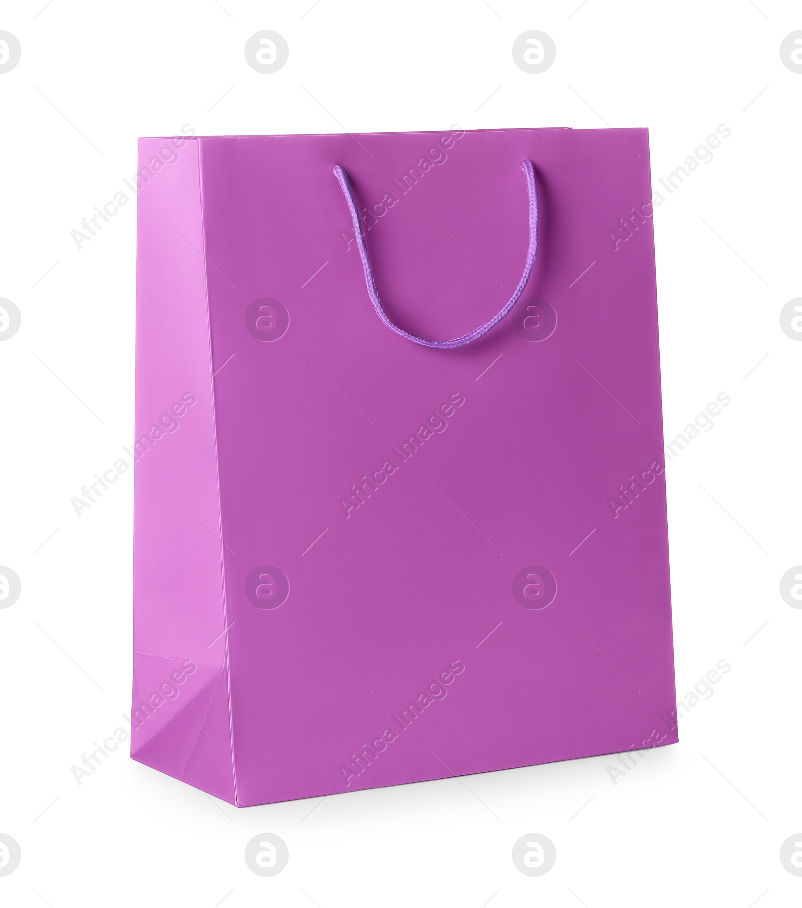 Photo of One violet shopping bag isolated on white