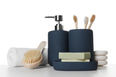 Bath accessories. Different personal care products on table against white background