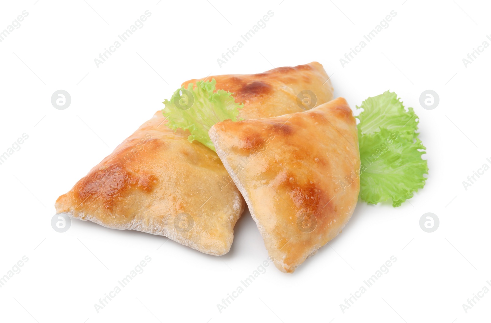 Photo of Delicious samosas and lettuce isolated on white