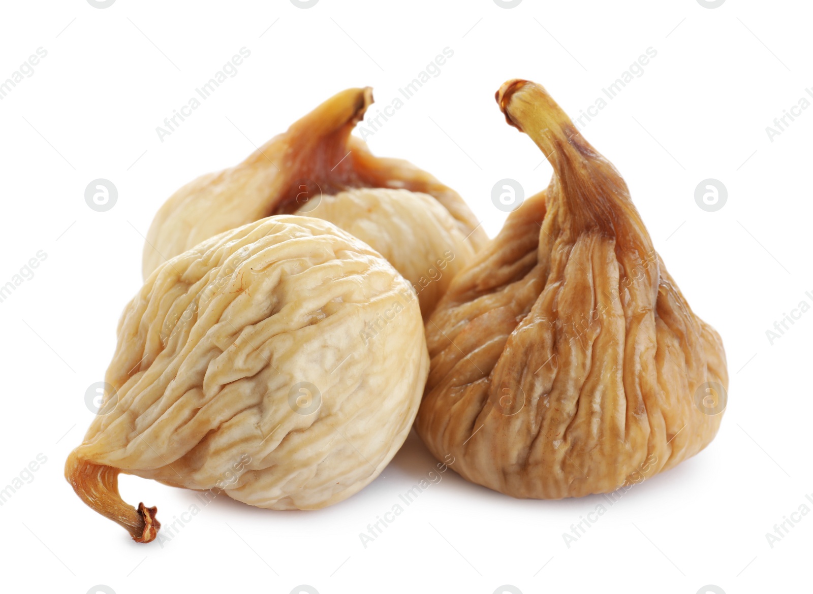 Photo of Pile of tasty dried figs isolated on white