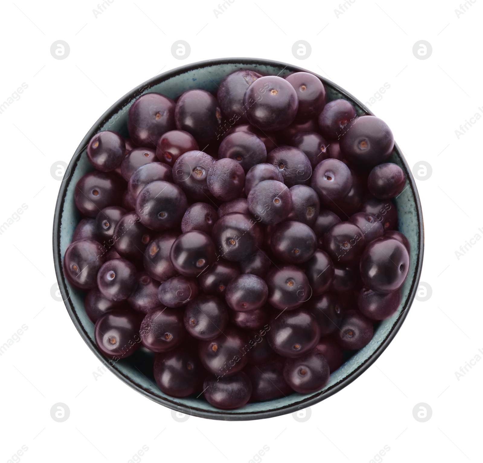 Photo of Fresh acai berries in bowl isolated on white, top view