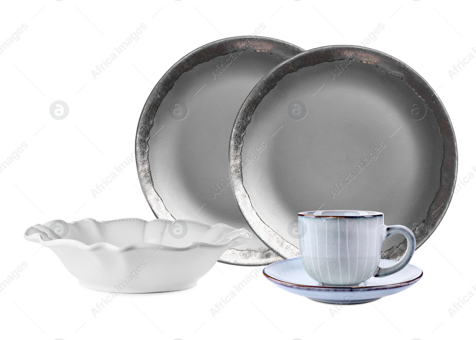 Image of Set of beautiful elegant dinnerware on white background