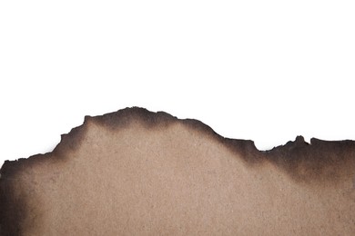 Piece of brown paper with dark burnt borders on white background, top view. Space for text