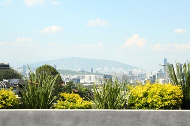 Beautiful view on city and mountains during sunny day