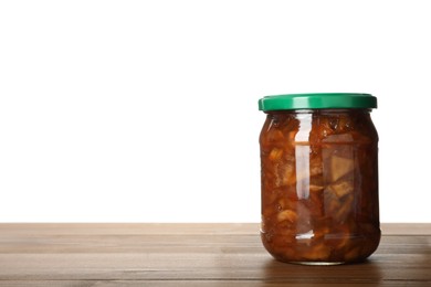 Photo of Glass jar with apple jam on wooden table against white background, space for text