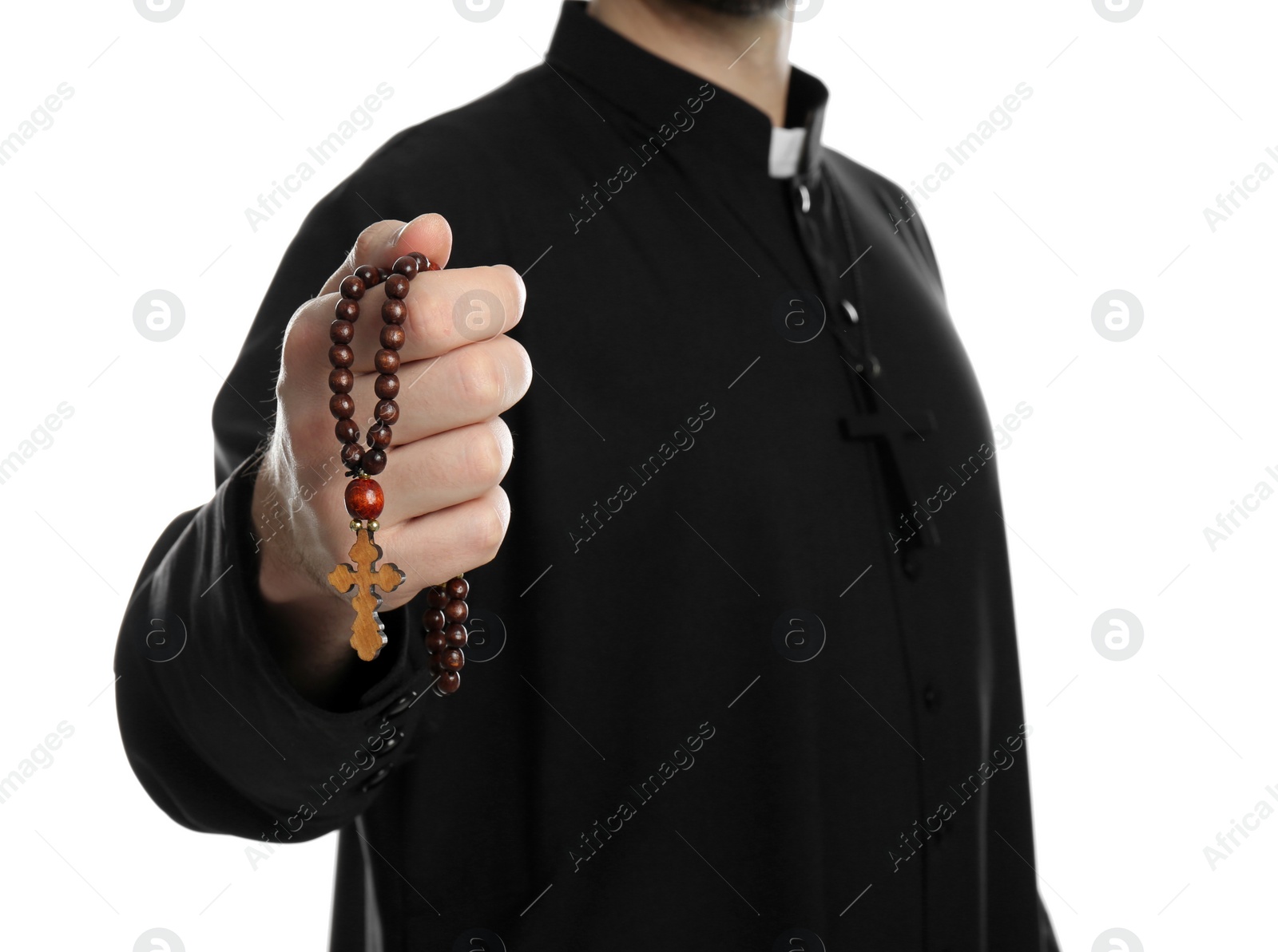 Photo of Priest with rosary beads on white background, closeup