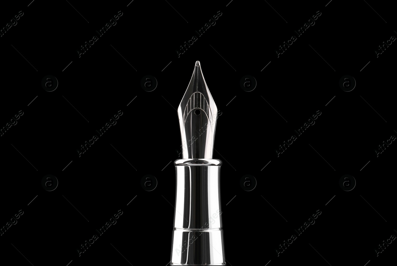 Photo of Stylish silver fountain pen on black background, closeup