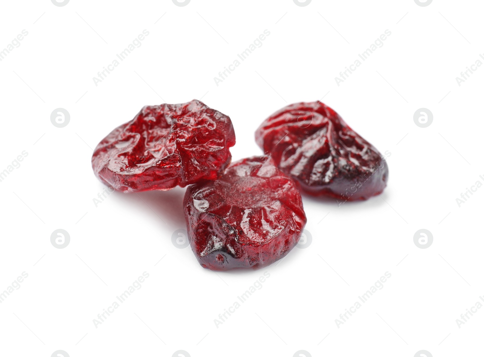 Photo of Dried cranberries isolated on white. Tasty berries