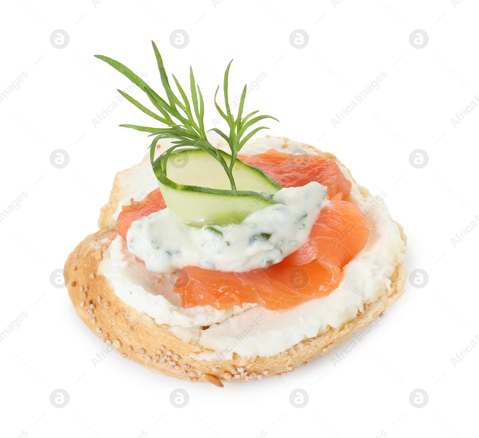 Photo of Tasty canape with salmon, cucumber, cream cheese and dill isolated on white