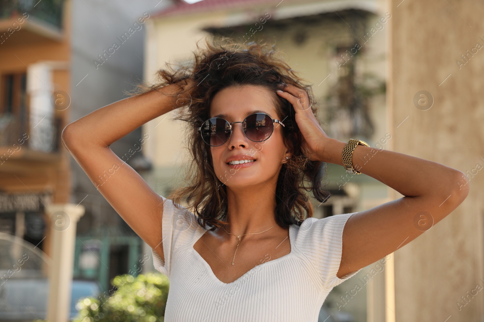 Photo of Portrait of beautiful young woman outdoors on summer day