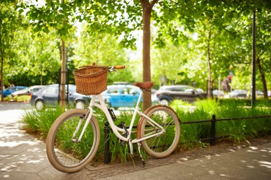 Photo of Beautiful bike with basket on sunny day outdoors