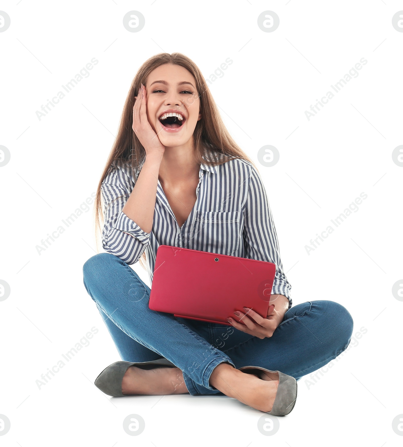 Photo of Emotional young woman with laptop celebrating victory on white background