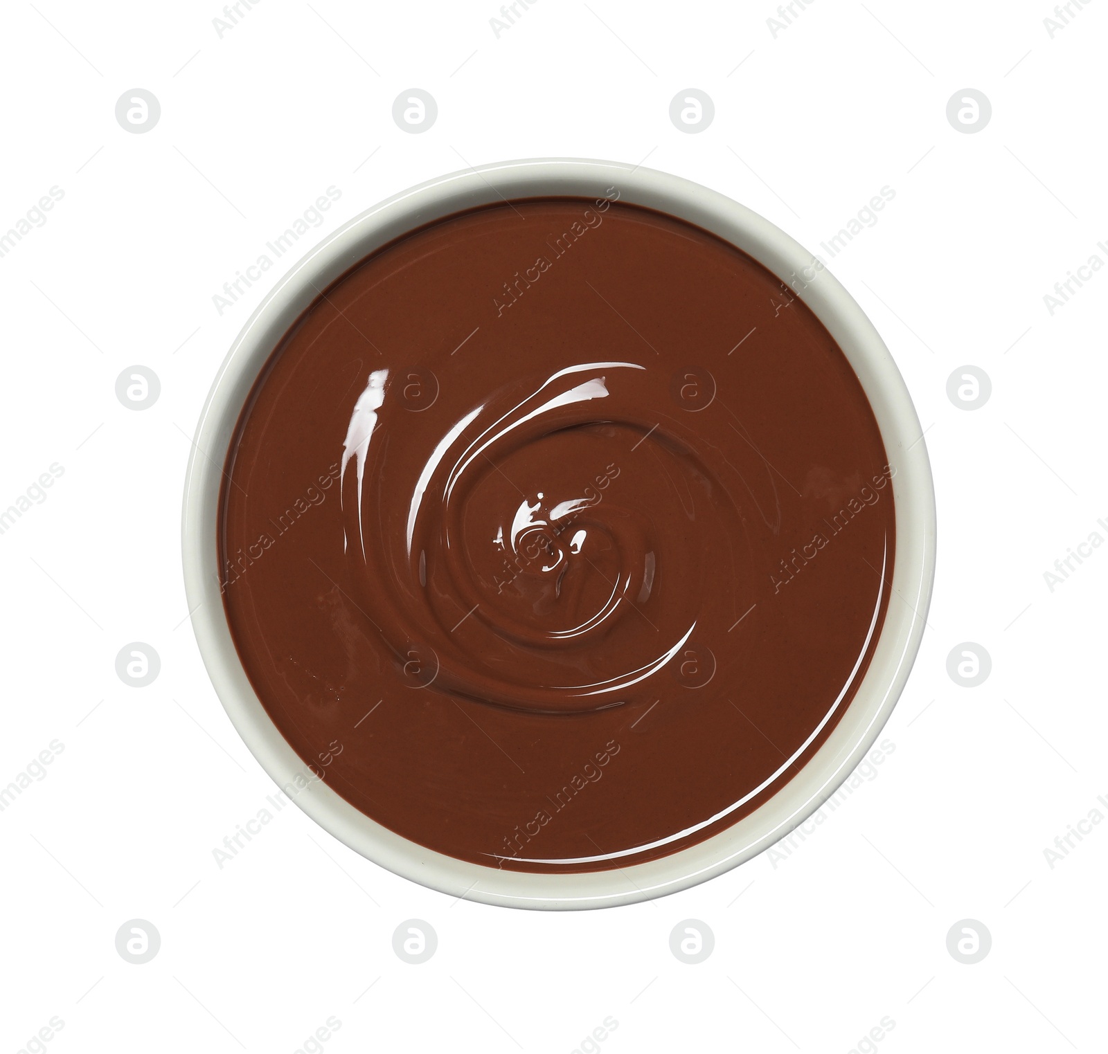 Photo of Melted milk chocolate in bowl isolated on white, top view