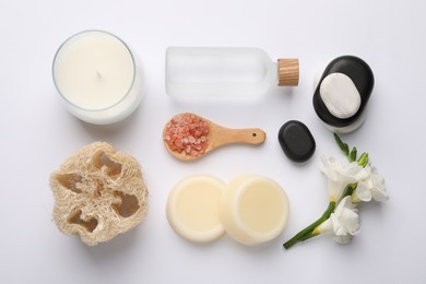 Flat lay composition with different spa products on white background