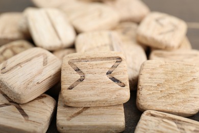 Photo of Pile of wooden runes as background, closeup view