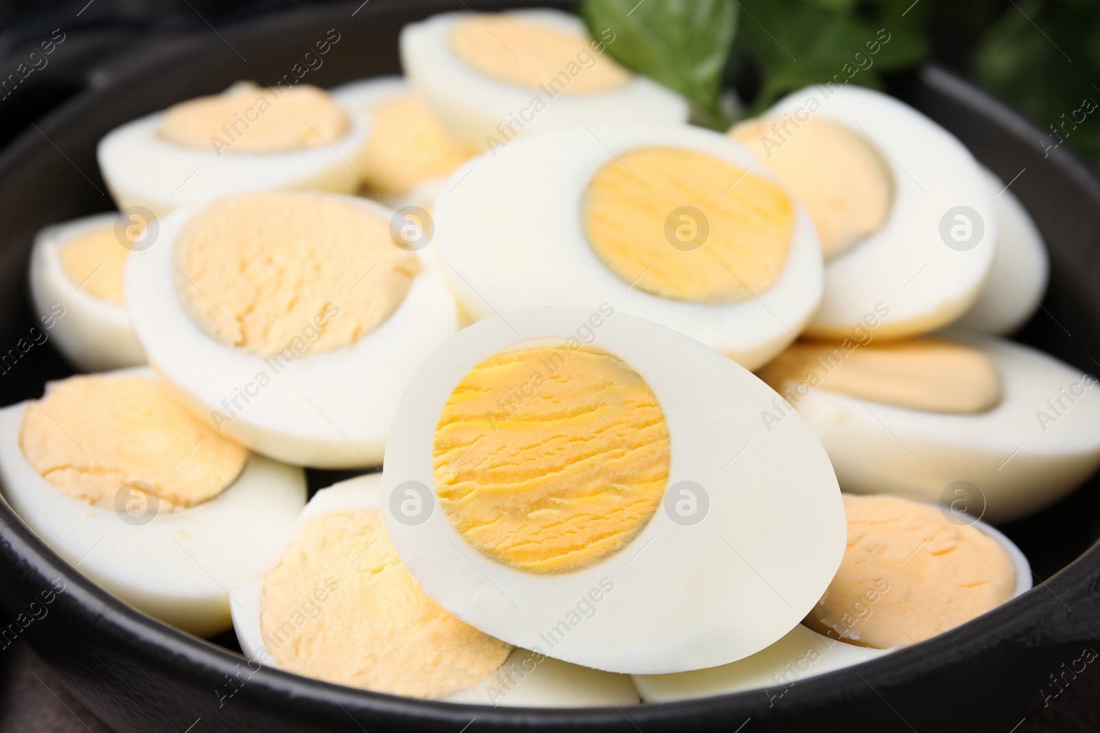 Photo of Bowl with fresh hard boiled eggs, closeup