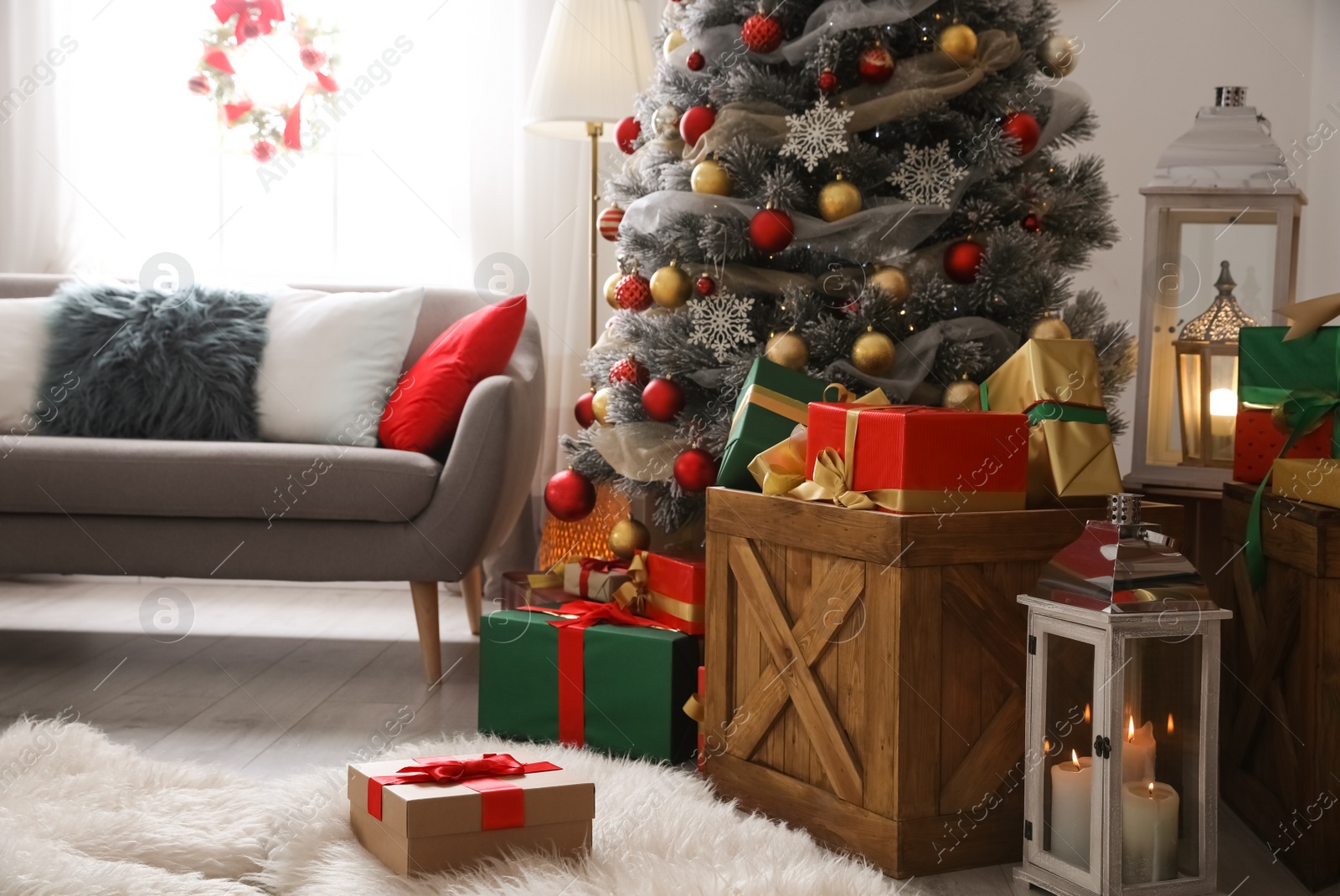 Image of Beautiful Christmas tree in living room. Festive interior