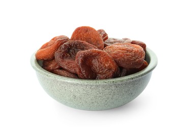 Photo of Ceramic bowl with tasty dried apricots isolated on white