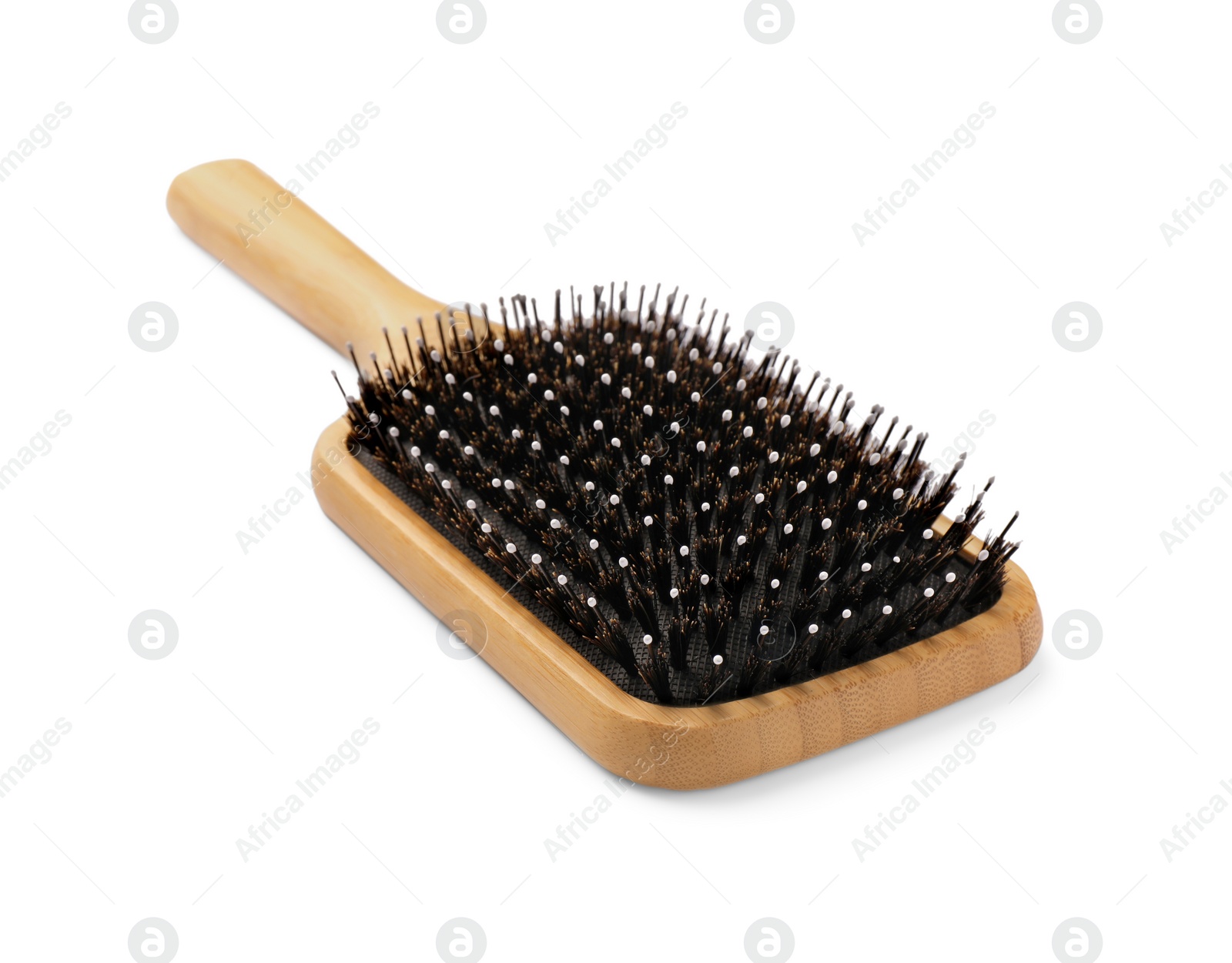 Photo of New wooden hair brush isolated on white