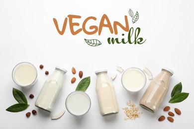 Image of Different organic vegan milks and ingredients on white background, flat lay