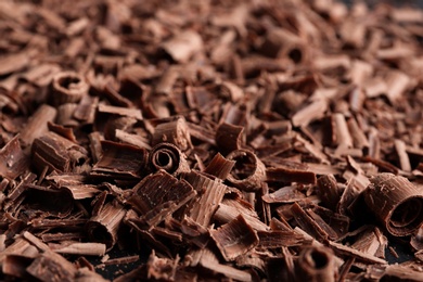 Pile of tasty chocolate curls as background