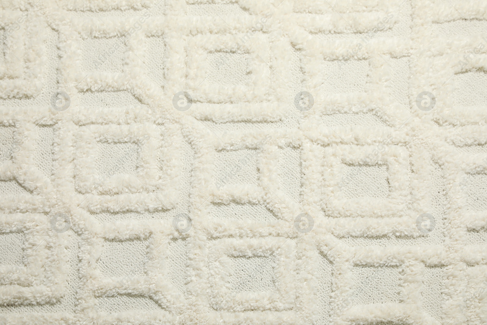 Photo of Texture of beautiful white carpet as background, top view