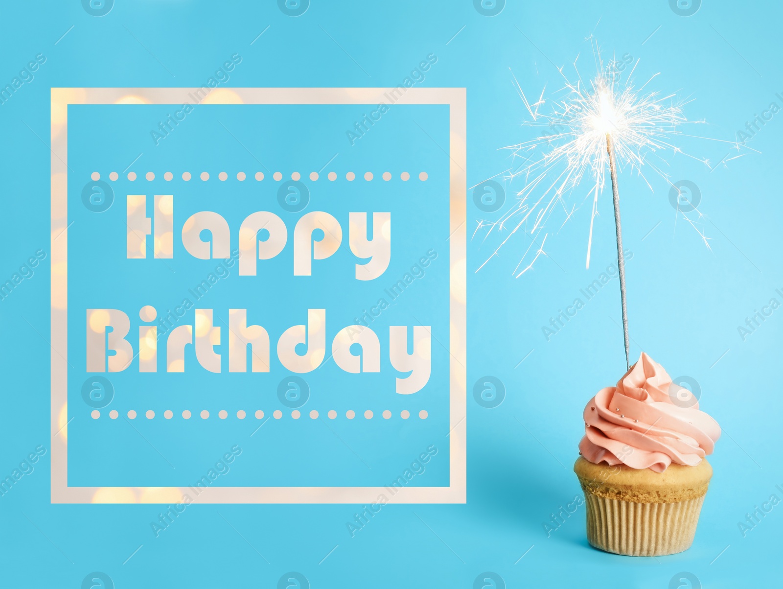 Image of Text Happy Birthday and delicious cupcake with sparkler on light blue background