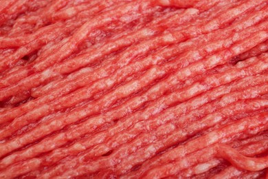 Photo of Raw fresh minced meat as background, closeup