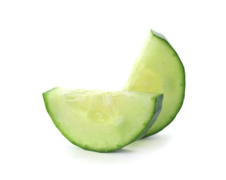 Photo of Slices of fresh cucumber on white background