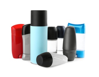 Set of different male deodorants on white background