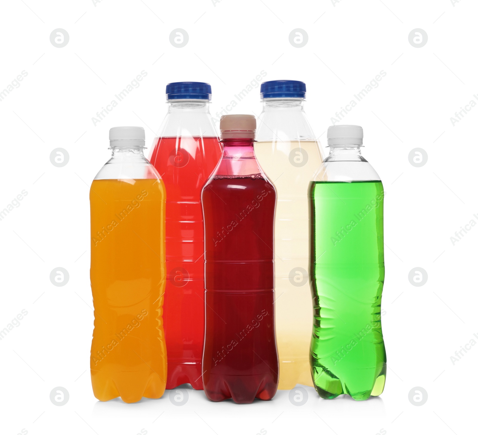 Photo of Bottles of soft drinks on white background