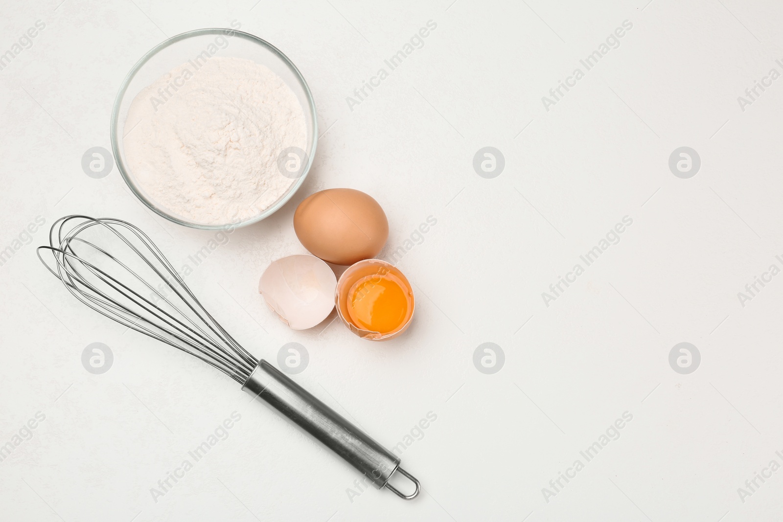 Photo of Flat lay composition with raw eggs on white table, space for text. Baking pie