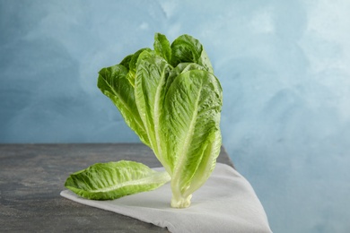 Photo of Fresh ripe cos lettuce on table